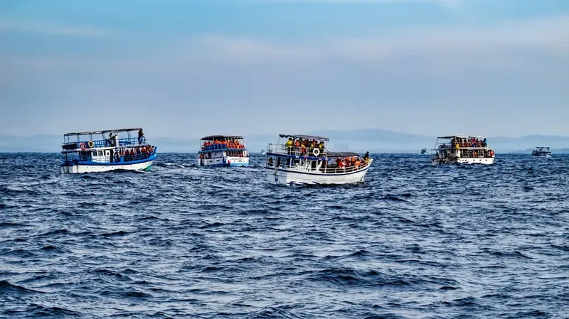 Shared whale watching boats heading out from Mirissa on a Mirissa whale watching tour, Sri Lanka